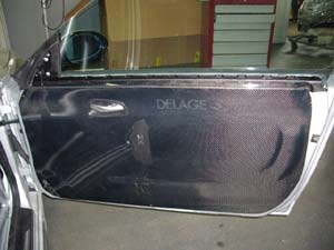 Panneau de porte Gauche Carbone - 250.00 HT